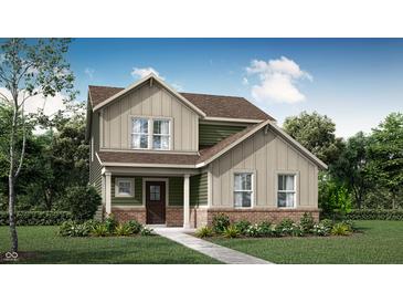 Charming two-story home with a brick foundation, covered porch, manicured lawn, and neutral color palette at 15387 Alperton Rd, Fishers, IN 46037