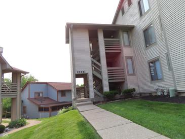Apartment complex exterior with well-maintained landscaping and visible unit numbers at 2931 Eagles Crest Cir, Indianapolis, IN 46214