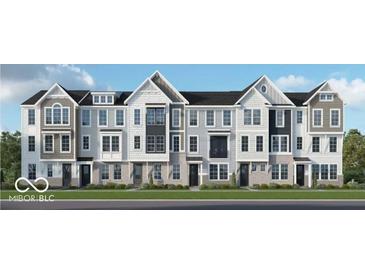 Modern townhome features varying colors and textures, gray brick accents, and a black roof at 406 Elite St # 2-604, Westfield, IN 46074