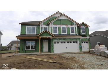 New two-story home featuring large windows and a two-car garage in an unfinished construction stage at 4947 Amber Crest Dr, Brownsburg, IN 46112