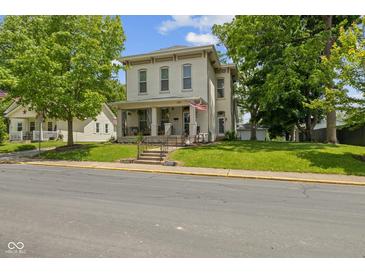 Beautiful two-story home with a well-kept lawn and lovely curb appeal at 245 S Washington St, Danville, IN 46122
