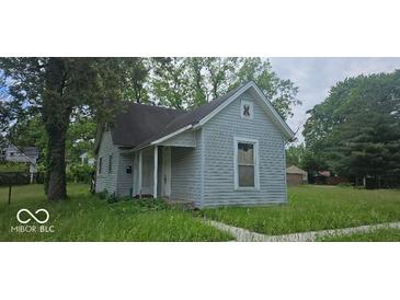 Charming exterior view of a cozy home with a neat roof and pleasant architectural details at 479 W Pike St, Martinsville, IN 46151