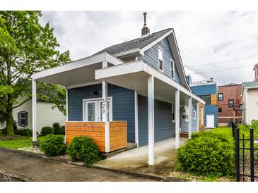 Charming exterior view showcasing the architecture and landscaping of the property at 529 E Merrill St, Indianapolis, IN 46203