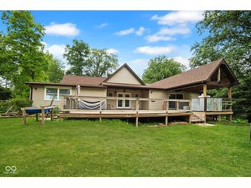 Expansive backyard featuring a large deck perfect for entertaining and outdoor living at 5116 W County Road 450 S, Coatesville, IN 46121