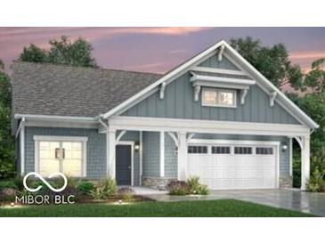 Charming one-story home with blue siding, white trim, covered porch and attached garage, great curb appeal at 14844 Higgins Dr, Westfield, IN 46074