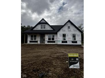 New construction home featuring classic architecture and large windows at 1960 Delp Ct, Avon, IN 46123