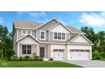 Stunning two-story home with white brick, gray siding, and a welcoming two-car garage at 4316 Persian St, Greenwood, IN 46143