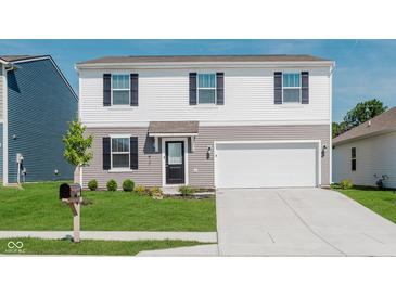 Two-story home with white and gray siding, black shutters, manicured lawn, and two car garage at 848 Holmdale Dr, Indianapolis, IN 46239