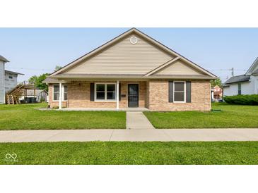 Charming single-story brick home with a well-manicured lawn and inviting front porch at 524 S Meridian S St, Lebanon, IN 46052