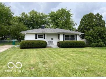 Charming single-story home featuring a well-maintained lawn and classic curb appeal at 618 W Mckenzie Rd, Greenfield, IN 46140