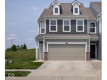 Charming two-story home with a neutral color palette and a spacious two-car garage at 14110 Bay Willow Dr, Fishers, IN 46037