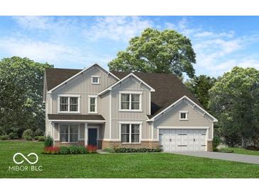 Charming two-story home featuring a modern design with a welcoming front yard and attached garage at 6770 W Buck Stone Dr, McCordsville, IN 46055