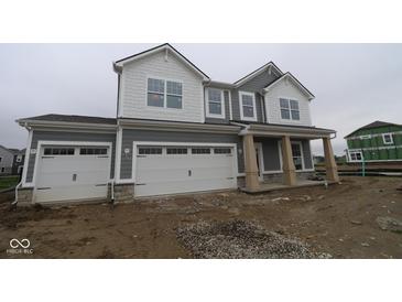Charming two-story home showcasing a two-car garage and craftsman-style architecture with gray and white color palette at 3993 Bozeman Way, Bargersville, IN 46106