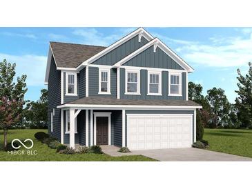 Charming two-story home with a covered front porch and a two-car attached garage at 7505 Firecrest Ln, Camby, IN 46113