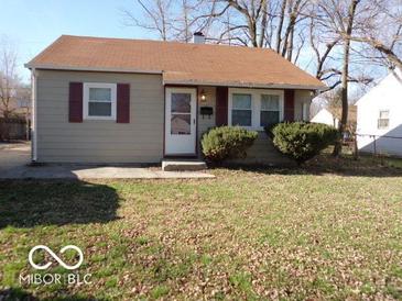 Charming single-story home with a well-maintained lawn and inviting curb appeal at 2250 N Goodlet Ave, Indianapolis, IN 46222