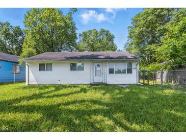 Charming single-story home with a well-maintained lawn and inviting curb appeal on a sunny day at 1931 Brentwood Dr, Anderson, IN 46011