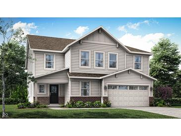 Charming two-story home features a gabled roof, a two-car garage, and beautifully landscaped front yard at 3695 Pinnacle Dr, Bargersville, IN 46106