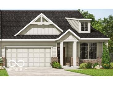 Charming single-Gathering home featuring a two-car garage and a welcoming front porch with classic architectural details at 3914 Holly Brook Dr, Westfield, IN 46062