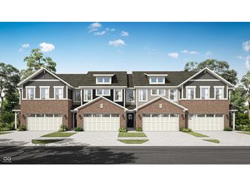 Charming townhome complex with brick accents, garages, and well-manicured lawns offers comfortable and stylish living at 6659 Halsey St, Zionsville, IN 46077