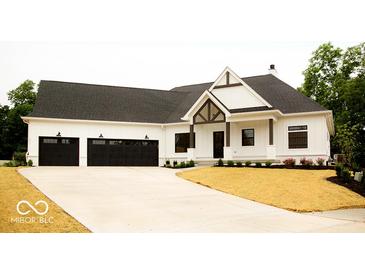Charming home featuring a black roof, white siding, and a spacious three-car garage at 10101 - Lot 2 N Alford Rd, Fortville, IN 46040