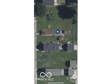 Aerial view of the property showing the home and surrounding yard at 2021 Columbia Ave, Indianapolis, IN 46202