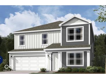 Charming two-story home with a modern design and a two-car garage and white and gray siding at 9334 Hemingway Dr, Indianapolis, IN 46239
