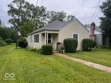Charming single-story home featuring a well-maintained lawn and cozy front porch at 111 S Jefferson St, Brownsburg, IN 46112