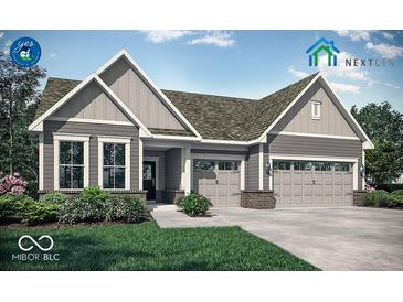 Charming single-Gathering home boasting a two-car garage and welcoming front yard with beautiful landscaping at 17030 Daly Dr, Noblesville, IN 46062