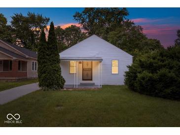 Charming home exterior with freshly cut grass, a well-kept lawn and classic design at 4310 Crittenden Ave, Indianapolis, IN 46205