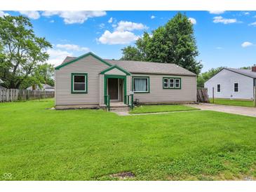 Charming single-story home with a well-manicured lawn and classic siding at 818 Vasbinder Dr, Chesterfield, IN 46017