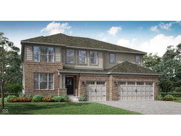 Two-story home featuring a three-car garage, brick and siding exterior, and a well-manicured lawn at 15424 Manderley St, Fishers, IN 46040