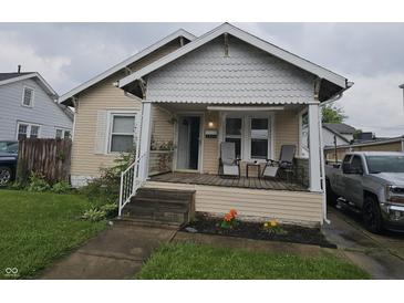 Charming bungalow featuring a cozy front porch, inviting curb appeal, and well-maintained landscaping at 2824 Brown St, Anderson, IN 46016