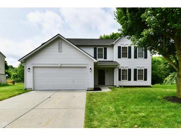 Charming two-story home featuring a two-car garage, green lawn, and classic architectural design at 5759 Columbia S Cir, Greenwood, IN 46142