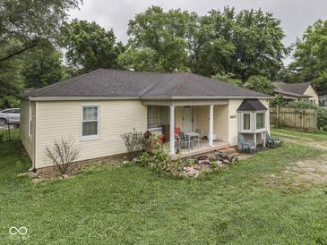 Charming single story home featuring a covered porch and quaint front yard at 1603 S Morgantown Rd, Greenwood, IN 46143