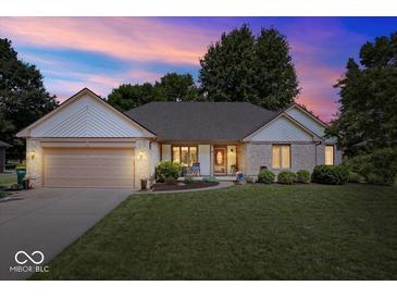 Charming ranch home with brick facade, attached garage, and beautifully maintained lawn at 770 Viewpoint Dr, Plainfield, IN 46168