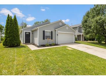 Charming single-story home with a well-manicured lawn and an attached two-car garage at 2080 Bridlewood Dr, Franklin, IN 46131
