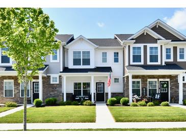 Inviting townhouse exteriors with manicured lawns and charming front porches create a welcoming curb appeal at 3443 Thomas Jefferson St, Westfield, IN 46074