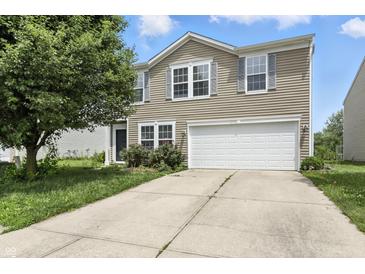 Inviting two-story home with a well-maintained lawn and a two-car garage at 1236 N Aberdeen Dr, Franklin, IN 46131