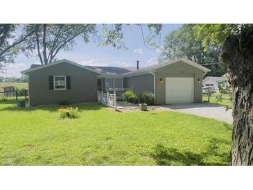 Charming one story home with well maintained lawn and attached one car garage at 8336 S Belmont Ave, Indianapolis, IN 46217