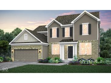Charming two-story home with brick and siding exterior, showcasing a well-manicured lawn and inviting front entrance at 18980 Seaforth Way, Westfield, IN 46074