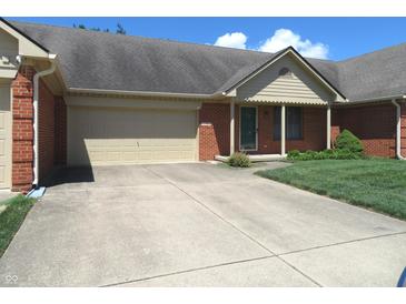 Charming single-story home with a brick facade, attached garage and well-maintained landscaping at 2996 Colony Lake W Dr, Plainfield, IN 46168
