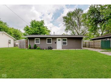 Charming single-story home with well-maintained lawn and neutral-toned exterior at 3149 Thayer St, Indianapolis, IN 46222