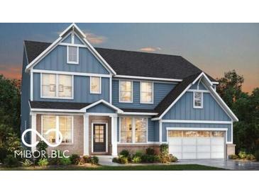 Charming two-story home featuring a two-car garage, and stylish blue siding and trim at 4955 Elaine Ct, Noblesville, IN 46062