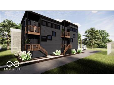 Modern two-story home with black siding, wooden accents, balconies, and professional landscaping at 517 Prospect St, Indianapolis, IN 46203