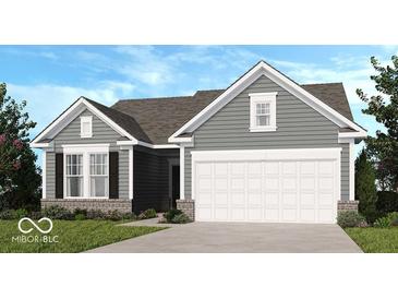Charming single-story home featuring horizontal siding, a two-car garage, and manicured landscaping at 289 N Bur Oak Dr, Mooresville, IN 46158