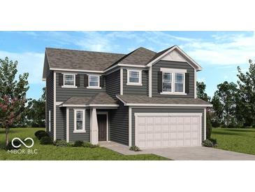 Charming two-story home with gray siding and a two-car garage at 8662 Hollander Dr, Camby, IN 46113