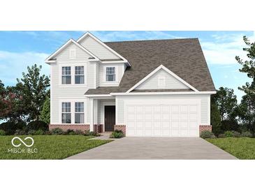 Charming two-story home with a brick foundation, white siding, a two-car garage and landscaped yard at 1073 E Valley Oak Ct, Mooresville, IN 46158
