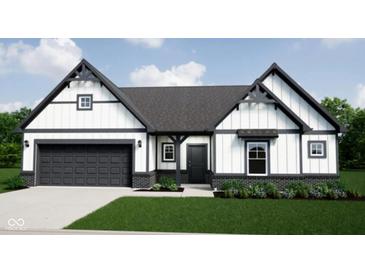 Charming home with black and white exterior, a well-manicured lawn, and an attached two-car garage at 10319 Little Island Dr, Indianapolis, IN 46239