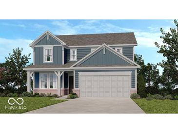 Charming two-story home featuring a light blue exterior, white trim, and attached two-car garage at 430 Louisiana Dr, Pittsboro, IN 46167