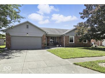 Charming single-story home with a well-maintained lawn and inviting curb appeal at 1011 Stevedon Ct, Plainfield, IN 46168
